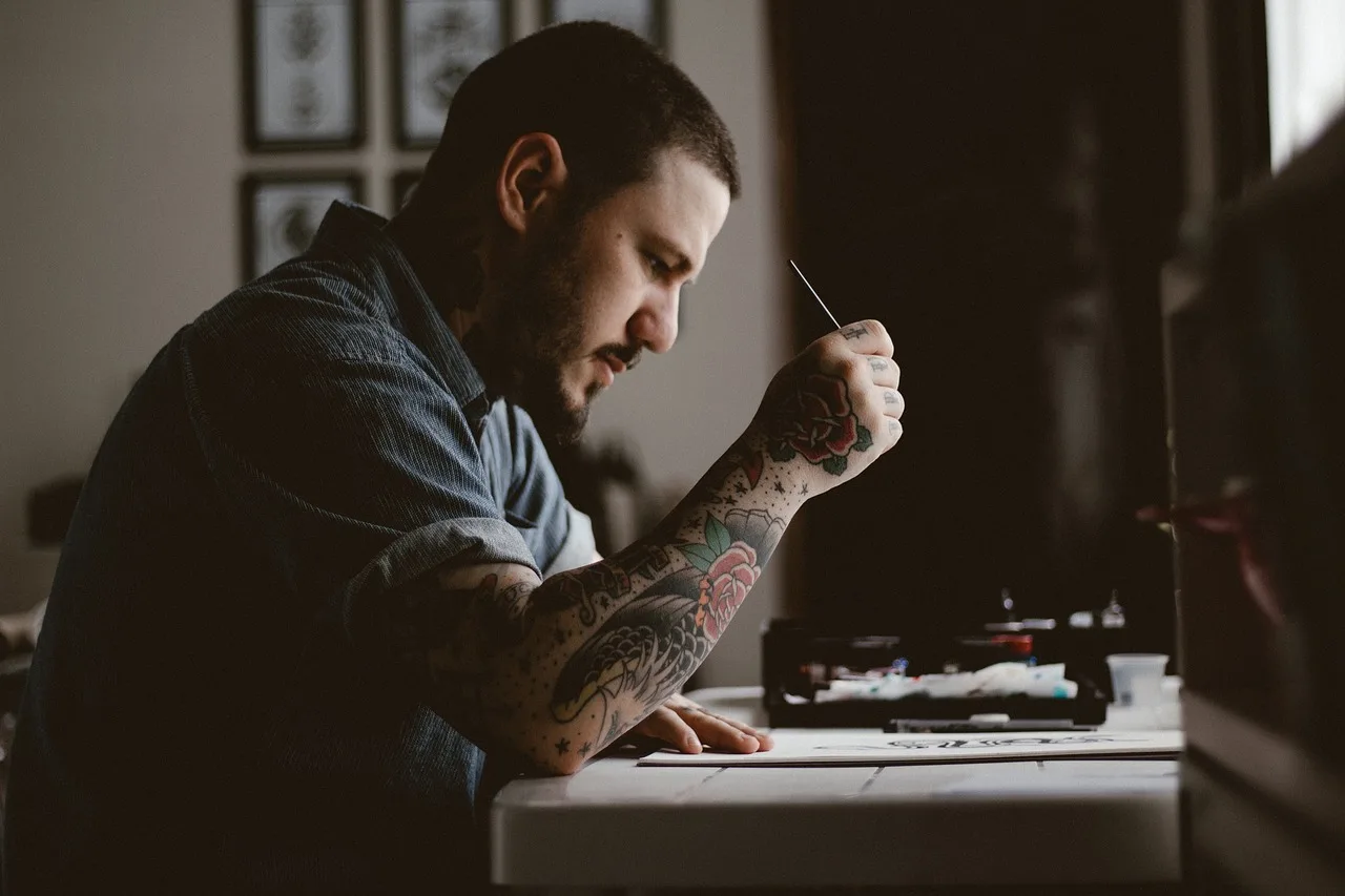 people, man, tattoo, drawing, design, artist, art, pen, paper, table, brown paper, brown art, brown table, brown design, brown drawing, tattoo, tattoo, tattoo, tattoo, tattoo