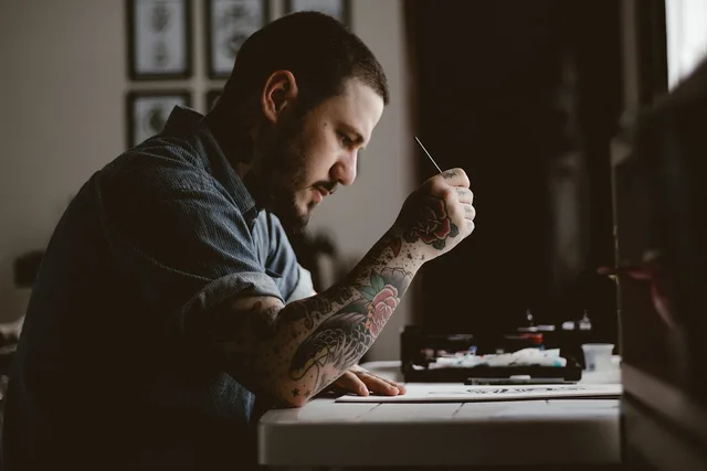 people, man, tattoo, drawing, design, artist, art, pen, paper, table, brown paper, brown art, brown table, brown design, brown drawing, tattoo, tattoo, tattoo, tattoo, tattoo. Branding agencies tool implementation: a pilot checklist